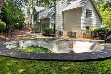Welcome home to this beautifully maintained brick-front - photo 33