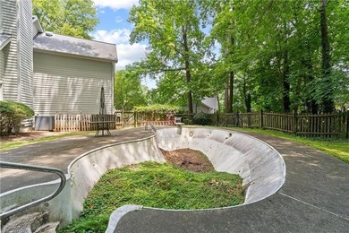 Welcome home to this beautifully maintained brick-front - photo 40