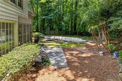 Welcome home to this beautifully maintained brick-front - photo 41