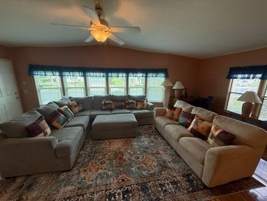 This well-cared for 2-bedroom, 2-bathroom, corner lot home is - photo 4