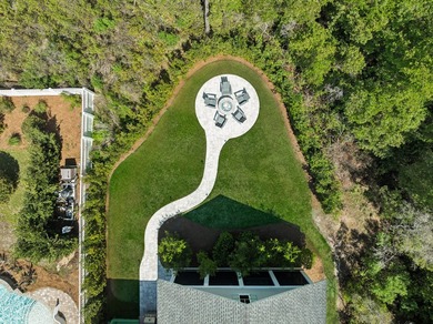 Located in WaterSound Origins, this Ficus plan built by Huff - photo 4
