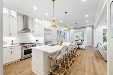 Located in WaterSound Origins, this Ficus plan built by Huff - photo 8
