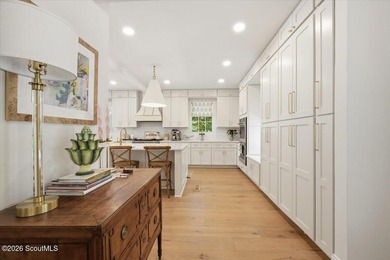 Nestled beneath a canopy of majestic live oaks in one of St - photo 5