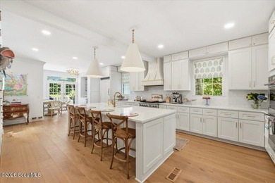 Nestled beneath a canopy of majestic live oaks in one of St - photo 6