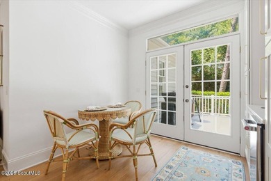 Nestled beneath a canopy of majestic live oaks in one of St - photo 9