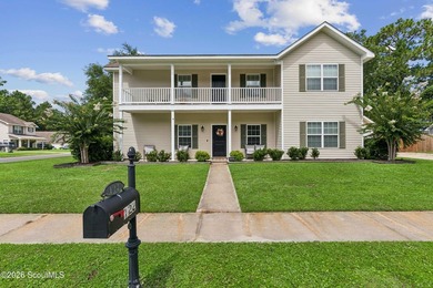 Gracefully positioned on a premium corner lot, this beautifully - photo 1