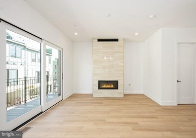 This elevator-equipped luxury townhome is truly stunning - photo 6
