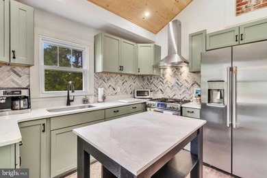 Stunning views & tranquil setting await you with this rare - photo 15