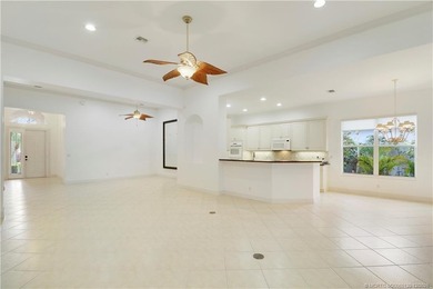 Step into light-filled elegance in this meticulously maintained - photo 15