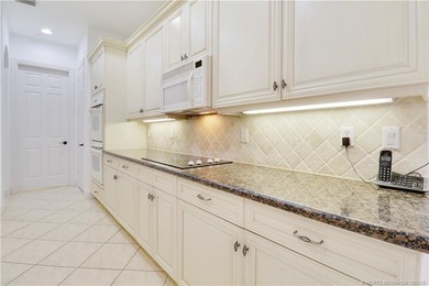 Step into light-filled elegance in this meticulously maintained - photo 20