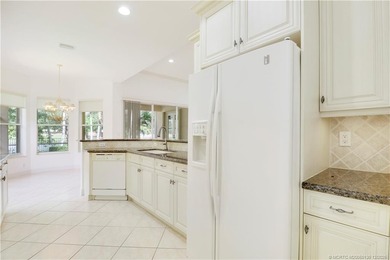Step into light-filled elegance in this meticulously maintained - photo 21
