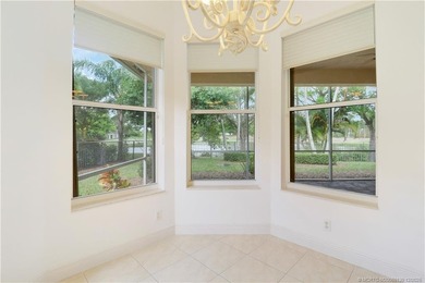 Step into light-filled elegance in this meticulously maintained - photo 23