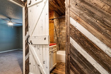 Versatile home in North Amarillo on a half-acre+ lot! Updated