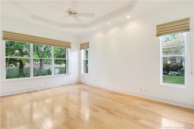 Step into light-filled elegance in this meticulously maintained - photo 27