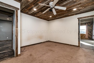 Versatile home in North Amarillo on a half-acre+ lot! Updated