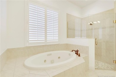 Step into light-filled elegance in this meticulously maintained - photo 31