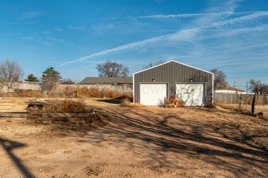 Versatile home in North Amarillo on a half-acre+ lot! Updated