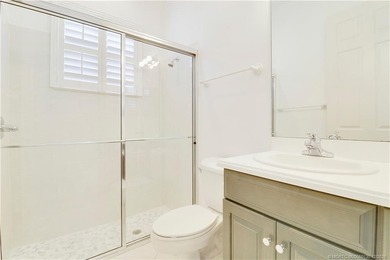 Step into light-filled elegance in this meticulously maintained - photo 36