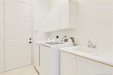 Step into light-filled elegance in this meticulously maintained - photo 37