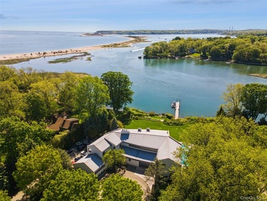 An Architectural Masterpiece nestled along the Shore in the - photo 2