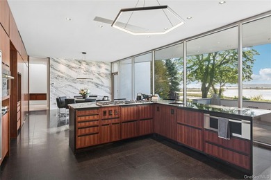 An Architectural Masterpiece nestled along the Shore in the - photo 8