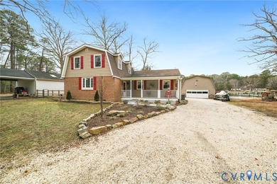 Embrace the art of waterfront living in this timeless retreat