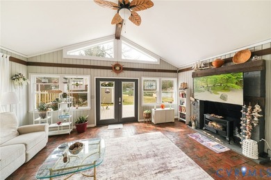 Embrace the art of waterfront living in this timeless retreat