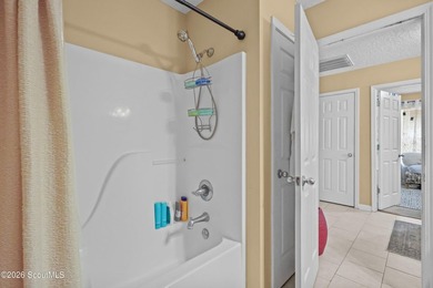 End Unit with Ceramic tile flooring flows throughout the home - photo 12