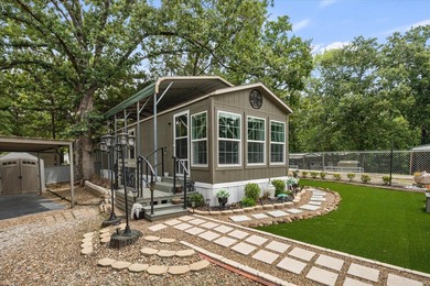 Escape to your own slice of paradise in the sought-after, gated - photo 1
