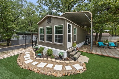 Escape to your own slice of paradise in the sought-after, gated - photo 2