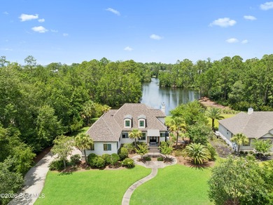 Situated along Stillwater Lake, 191 Stillwater Drive is a custom - photo 1