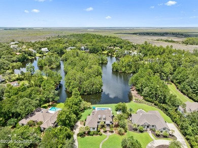 Situated along Stillwater Lake, 191 Stillwater Drive is a custom - photo 2