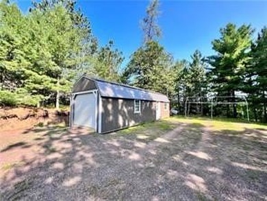 Introducing a charming property nestled on the serene shores of - photo 19