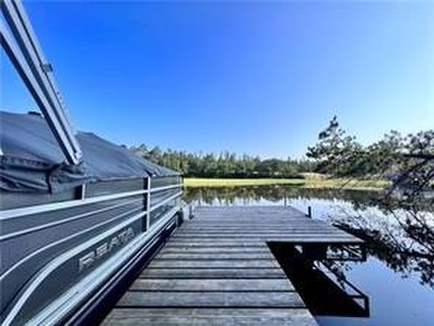 Introducing a charming property nestled on the serene shores of - photo 24