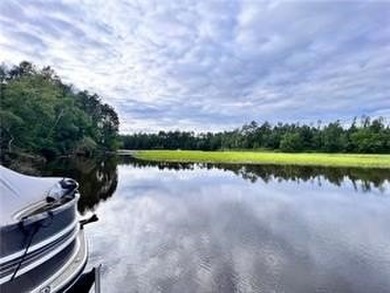 Introducing a charming property nestled on the serene shores of - photo 25