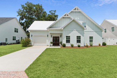 Welcome to effortless coastal living in the desirable Captains - photo 1