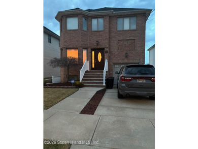 Welcome to 51 Petersons Lane! This legal 2 family side hall - photo 2
