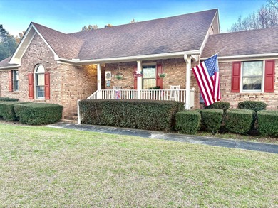 Charming Country Living Awaits You! Welcome to this delightful