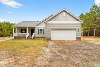 Built in 2021, this beautiful 3-bedroom, 2-bath country home