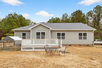 Built in 2021, this beautiful 3-bedroom, 2-bath country home