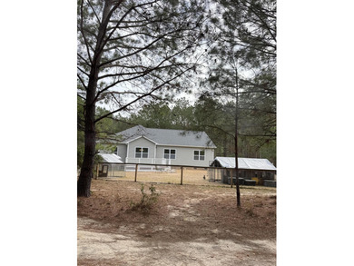 Built in 2021, this beautiful 3-bedroom, 2-bath country home