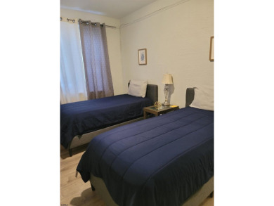 Fully furnished two-bedroom one block from the boardwalk. If you