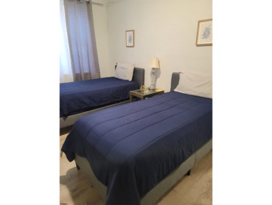 Fully furnished two-bedroom one block from the boardwalk. If you