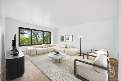 Spacious and filled with natural light, this two-bedroom home is - photo 1