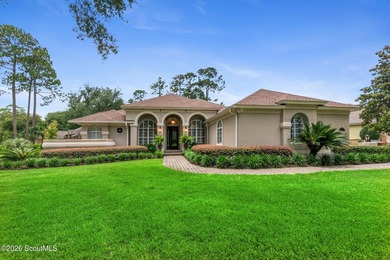 Welcome home to 5 Sandhill Crane Drive, a stunning custom-built