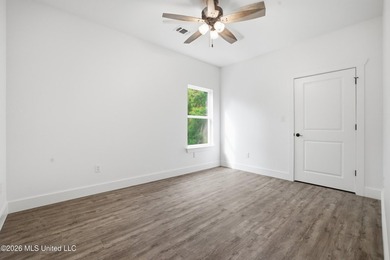 New construction in Historic Clermont Harbor near Bay St. Louis! - photo 14