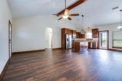 Discover this charming 3-bedroom, 2-bathroom home located in the - photo 9