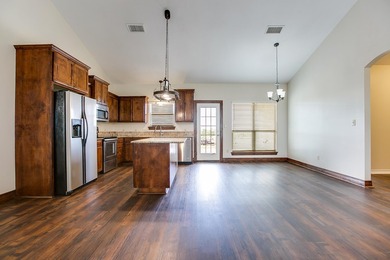 Discover this charming 3-bedroom, 2-bathroom home located in the - photo 10