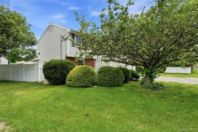 Welcome to this spacious hi-ranch in Bay Shore, offering endless - photo 2