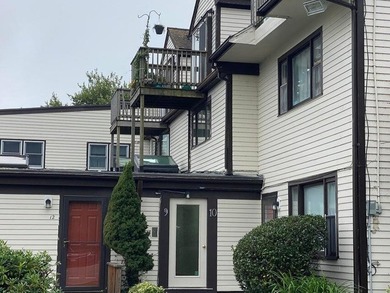 Three-level condominium offering space, flexibility, and a prime - photo 2